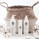 white Onne bottles and brown basket