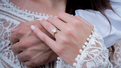 woman wearing gold diamond ring