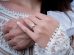 woman wearing gold diamond ring